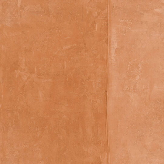 Velar Plain Marmalade, warm amber and burnt orange — the colour of afternoon light through glass. Marmalade is rich and radiant, the geometric structure giving the colour a depth that a flat wall could never achieve.